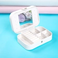 White PU leather jewelry box with mirror and ring slots shown on blue background - 16*11*5cm / White
