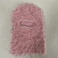 Detail of pink faux fur texture on a warm knitted Balaclava face mask for winter - One Size / Pink