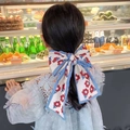 Floral print bow hair ribbon with blue piping trim for girls elegant styling accessory - Blue Flower
