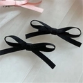 Detail of black velvet and pink ribbon bow hair clips on a white mesh background - F-013 Black 1pc
