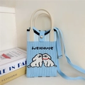 Detail of blue knitted handbag with white handles and cute cartoon dogs pattern - 11 Phone Bag-Best Buddies
