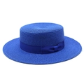 Close-up of a royal blue flat-top boater straw hat featuring a matching grosgrain bow - Sapphire Blue