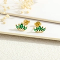 Macro shot of 18K gold plated leaf earrings with emerald green marquise cut zircons - Emerald Five Petal Crown (ER1197-C)