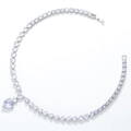 Close-up of heart-shaped pendant with sparkling cubic zirconia on a silver-tone chain - Silver White Zirconia Necklace
