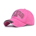 Close-up of TEXAS FOREVER embroidery and leather trim on washed cotton baseball cap - Rose Red
