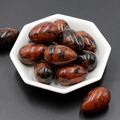 Polished red mahogany obsidian egg stones 30mm displayed in a hexagonal white bowl - Gold Swan Stone (1pc)