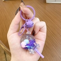 Cute purple lollipop keychain with glittery floating sand sequins and purple bow - Purple Lollipop Milk Bean