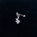 Macro view of silver stainless steel heart earrings with marquise zircon flower cluster - Steel Color-Leaf