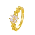 Adjustable gold flower vine ring with four heart-shaped cubic zirconia stones - Light Gold Heart Zirconia Flower Ring (4575)