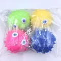 Set of four colorful octopus squeeze toys in green, yellow, pink, and blue colors - Bath Dolphin 4pcs