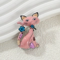 Close-up of pink enamel cat brooch with blue floral details and polished alloy finish - Pink Cat