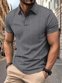Detail of dark gray men's knit polo shirt featuring a premium textured chevron fabric - Dark Gray
