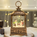 Bronze vintage Christmas lantern with snowmen family and warm LED glowing light - Snowman Family of Three