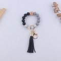 Black and marble silicone bead keychain bracelet with a wooden bead and long leather tassel - Black
