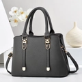 Chic dark gray lychee pattern handbag with gold hardware on a minimalist display - 28cmx12cmx20cm / Gray