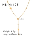 Dettaglio del ciondolo a farfalla in oro 18K con zirconi e catena con nappe - Stile Farfalla Dorata a Y (NB-N1108) / Oro 18K