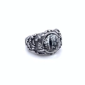 Close-up of gothic demon eye ring with silver eagle wings and black white eyeball inlay - Grey Eye