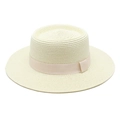 Detail of off-white straw boater hat with fine weaving and elegant pink satin ribbon band - Cream