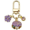 Exquisiter goldener Schlüsselanhänger mit lila Muschel, Perle und rosa Kristallblume - Lila Ozean Perle Muschel Sakura