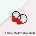 Pair of red heart hair ties with black elastic bands for kids Valentine's Day gift - Pair of Kids Heart Hair Ties