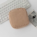 Square camel corduroy makeup bag with durable metal zipper on a white desktop - Apricot