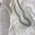Macro detail of round grey Akoya-style pearls with silver luster on white silk fabric - S925 Silver Buckle/Faux Pearl / 6mm/45cm