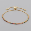 Adjustable gold bracelet featuring a vibrant row of multi-colored square zircon stones - Rainbow Square Block Zircon Style (SL0008) / Gold