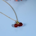 Sweet cherry pendant necklace with red translucent beads and golden leaves on gold chain - Cherry Pendant Necklace (FN1013)