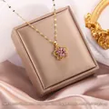 Gold titanium steel necklace with purple petal pendant and crystals, 45cm chain length - Rotating Flower Style B (A217)