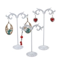 3-piece white T-bar metal earring display stands with vintage scroll pattern bases - Wave Shape / White