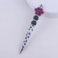 Detail of DIY beaded pen featuring pink silicone paw bead and rhinestone spacers - Dog Paw Rose Red