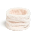 Close-up of soft light pink coral fleece neck warmer texture for winter protection - Beige