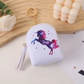 White unicorn coin purse with purple star pattern, gold chain and tassel detail - White Pony