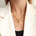 Minimalist 18k gold heart pendant necklace with asymmetrical chain on female model - 42+5cm / Gold Necklace