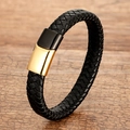Braided black leather bracelet with dual-tone gold and black magnetic clasp on wood - Black Woven Leather With Gold & Black Magnetic Clasp