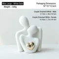 Modern white ceramic couple figurines with polished gold heart accents and matte finish - B495-0001 Mini Large Platinum