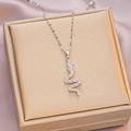 Elegant silver snake pendant necklace with pavé cubic zirconia on a luxury jewelry box - 6029 Snake Zircon / Silver