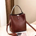 Dark brown crocodile embossed bucket bag with top handle and adjustable shoulder strap - Coffee