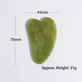 Detail showing dimensions of green jade gua sha tool with 70mm height and 44mm width - Heart / Light Green