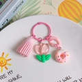 Pink tulip resin keychain with matching pink tassel and donut pendant accessory - Transparent Pink Green Leaf Tulip