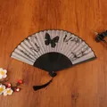 Classic Chinese folding fan with black bamboo ribs and ink butterfly pattern on silk - Artistic Butterfly