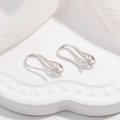 Detailed macro view of S925 sterling silver pearl earring hooks for DIY jewelry making - Style B: Hollow High Heels / Silver
