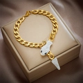 Detailed view of a golden Cuban link bracelet with a sparkling crystal snake head pendant - Snake Head Cuban Chain (B736) / Gold