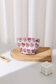 Macro detail of vintage jacquard cosmetic bag featuring red strawberry floral embroidery - Small Strawberry