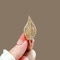 Golden leaf-shaped bow brooch with small crystal inlay and minimalist metal design - 299# Leaf
