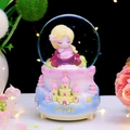 Fairytale crystal ball music box with cartoon girl and colorful castle base - 2425 The Blonde / Large Size 100+ Spins + Snow + Colored Lights + Music