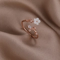 Macro detail of rose gold flower ring with shell petals and zircon stones on silk - Shell Flower (Rose Gold) (21696A)