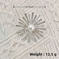Silver starburst brooch with pearl and rhinestones, width 41.3mm and weight 12.5g - Silver Snowflake