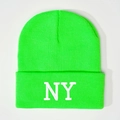 Close-up of neon green knit beanie featuring white NY embroidery and ribbed texture - One Size / Fluorescent Green