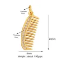 Golden comb shaped pendant with sparkling zircon stones inlay, size 23mm x 9mm - Gold Zirconia Comb